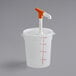 A white plastic container with an orange and white Choice condiment pump on top.