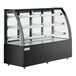 An Avantco black curved glass dry bakery display case with shelves.