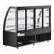 An Avantco black curved glass dry bakery display case with three shelves on wheels.