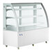 An Avantco white refrigerated bakery display case with curved glass shelves.