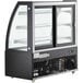 An Avantco black 3-shelf curved glass refrigerated bakery display case.