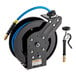 a black and blue hose reel