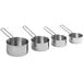 A group of stainless steel measuring cups with wire handles.