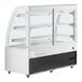 A white Avantco dry bakery display case with curved glass doors and 3 shelves.