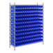 A metal wire shelving unit with blue bins on shelves.