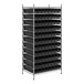 A metal wire shelving unit with black bins.