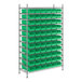 A metal Regency wire shelving unit with green bins.