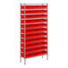 A metal wire shelving unit with red bins on metal shelves.