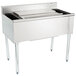 A stainless steel Eagle Group underbar cocktail and ice bin with a post-mix cold plate and eight bottle holders.