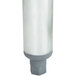 A close-up of a white cylinder with a silver object inside.