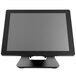 A black rectangular Custom EVO TP6 POS Terminal with a white screen on a white counter.