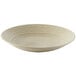 A white plate with a curved pattern on it.