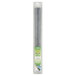 A close up of a grey plastic stick with a green label.