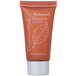 A white bottle of Ecossential Naturals shampoo with a brown label.