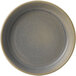 A Dudson Evo matte granite stoneware olive/tapas dish with a speckled pattern on a gray plate.