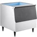A stainless steel Hoshizaki ice storage bin with a blue lid.