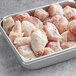 A tray filled with raw Rastelli's Chicken Osso Bucco