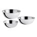 A group of three silver stainless steel mixing bowls.