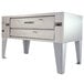 A large stainless steel Bakers Pride pizza oven.