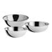 A set of three stainless steel Choice mixing bowls.