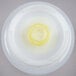 A white plastic FIFO squeeze bottle with a yellow circle on the lid.