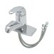 A silver T&S single lever faucet with flexible supply lines and a hose attached.