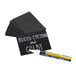 A stack of American Metalcraft white cards with black writing on them and a chalk marker.