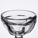 A close up of a clear Libbey Sherbet Glass with a small handle.