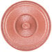 A close-up of a pink circular tortilla server lid.