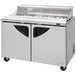 A Turbo Air Super Deluxe refrigerated sandwich prep table with clear lid and two doors.