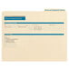 A white file folder with blue text and borders that reads "Employment History"