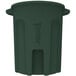 A green plastic Toter round trash can with a black lid.