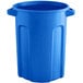 A blue Toter commercial trash can with a lid.