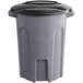 A dark gray Toter rotational molded plastic trash can with a black lid.