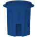 A blue plastic Toter trash can with a lid.