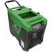 A green and black XPOWER commercial dehumidifier with wheels.