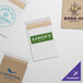 A Lavex Stayflats white envelope with a green logo containing small business cards.