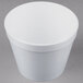 A white styrofoam container with a lid.