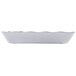 A white rectangular melamine tray with a scalloped edge.