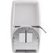 A white granite vertical surface-mounted baby changing station with black straps.