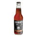 A case of 24 Jones Root Beer sodas with brown liquid in a glass bottle.