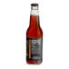A Jones Root Beer soda bottle with a label on it.