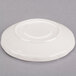 A CAC ivory china demitasse saucer with scalloped edges.
