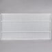 A white wire shelf with a white background.