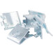 A group of four metal clips for a True white coated wire shelf.