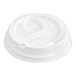 A white plastic Dixie lid with a hole for a cup.