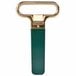A Franmara brass-plated cork extractor with a green and gold sheath.