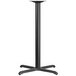 A black metal Flash Furniture bar height table base with a cross base.