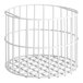 A white wire shelf with a white metal cage and bars.