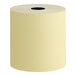 A canary yellow 1-ply bond cash register POS paper roll.